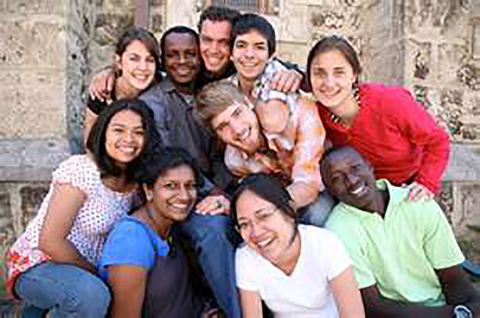 Group of smiling students posting for a photo. AMerican High School Academy.
