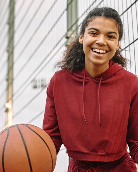 black-american-woman-holding-basketball