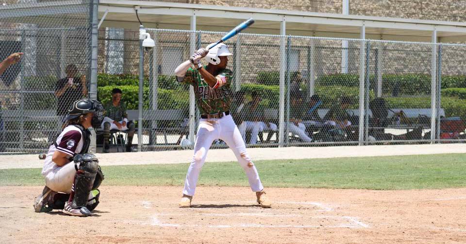 photo of Jesus Moreno, AAHS NCAA student up at bat during a student baseball game.