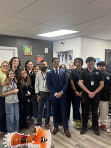 Aviation high school Miami students with Commissioner Roberto Gonzalez during his visit to AHSA’s Kendall campus showcasing STEM and aerospace programs.